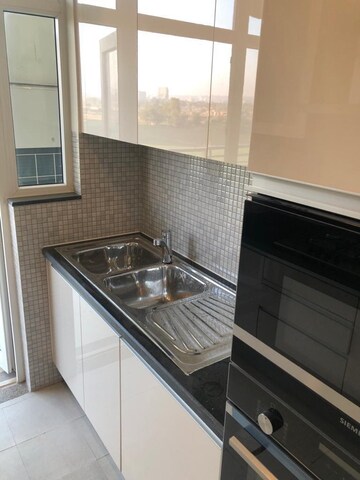 Kitchen in 4 BHK Apartment at DLF The Ultima, Sector 81 – for Rent