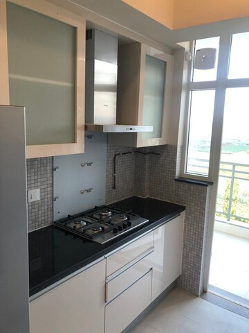 Kitchen in 4 BHK Apartment at DLF The Ultima, Sector 81 – for Rent