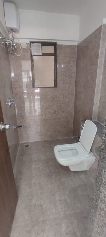 Bathroom in 1 BHK Apartment at Parinee Essence, Kandivali West – for Rent