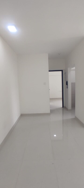 Living Room in 1 BHK Apartment at Parinee Essence, Kandivali West – for Rent