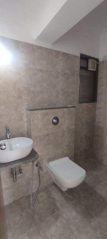 Bathroom in 1 BHK Apartment at Parinee Essence, Kandivali West – for Rent