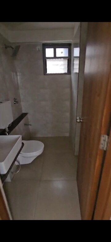 Bathroom in 3 BHK Apartment at Shivalik Sharda Park View 2, Shela – for Rent