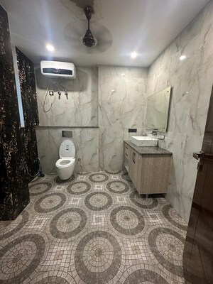 Bathroom in 4 BHK Builder Floor at Sushant Lok I – for Sale