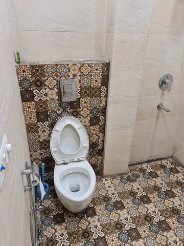 Bathroom in 4 BHK Builder Floor at Sushant Lok I – for Sale