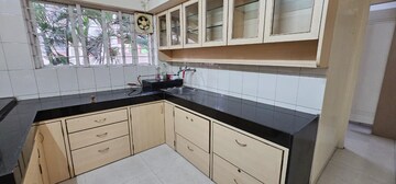 Kitchen in 3 BHK Apartment at Swojas Shilpa, Erandwane – for Rent