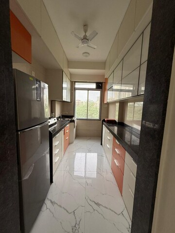 Kitchen in 2.5 BHK Apartment at Tattva Mittal Cove, Andheri West – for Rent