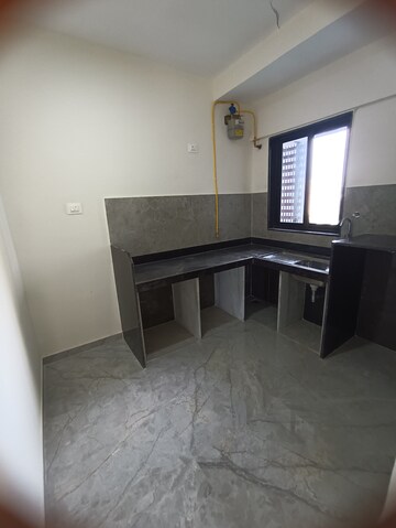 Kitchen in 2 BHK Apartment at Ajmera Boulevard, Malad West – for Rent