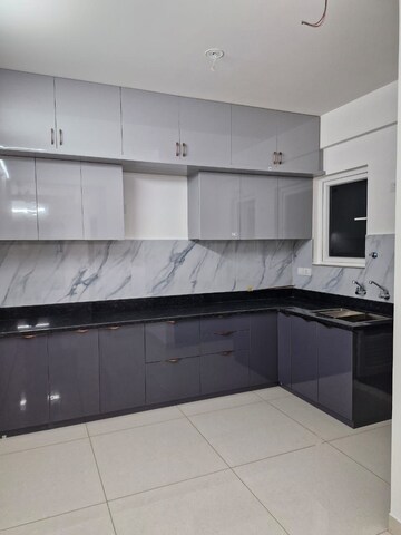 Kitchen in 2 BHK Apartment at Aparna Sarovar Zicon, Nallagandla – for Rent