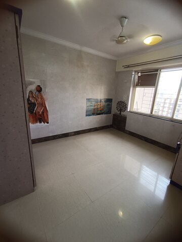 Bedroom in 2 BHK Apartment at Agarwal Trinity Towers, Malad West – for Rent