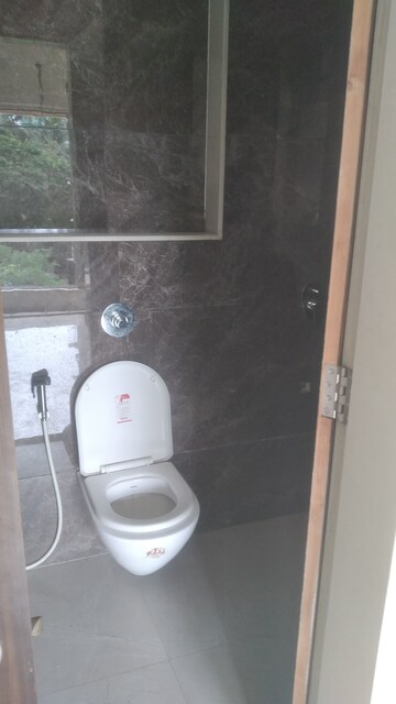 Bathroom in 3 BHK Apartment at Vardhman Grandeur, Andheri West – for Rent