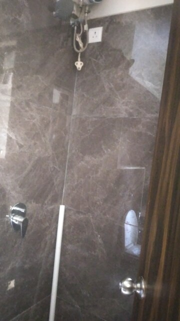 Bathroom in 3 BHK Apartment at Vardhman Grandeur, Andheri West – for Rent