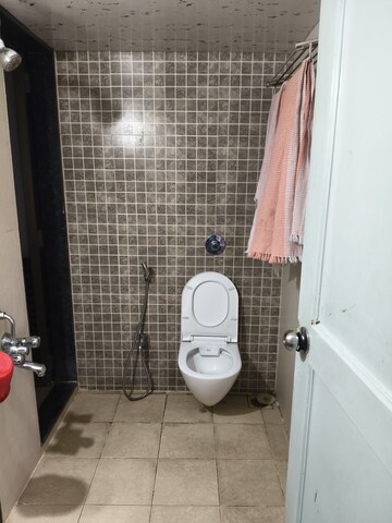 Bathroom in 1.5 BHK Apartment at Dosti Vihar, Samata Nagar – for Rent