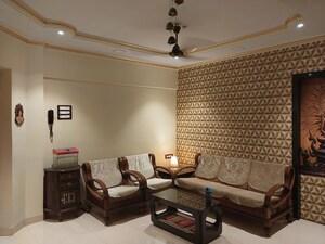 Living Room in 2 BHK Apartment at Lokpuram CHS, Vasant Vihar – for Sale