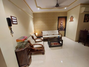 Living Room in 2 BHK Apartment at Lokpuram CHS, Vasant Vihar – for Sale