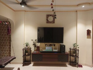 Living Room in 2 BHK Apartment at Lokpuram CHS, Vasant Vihar – for Sale