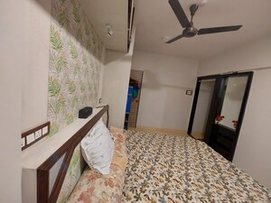 Bedroom in 2 BHK Apartment at Lokpuram CHS, Vasant Vihar – for Sale