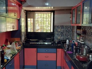 Kitchen in 2 BHK Apartment at Lokpuram CHS, Vasant Vihar – for Sale