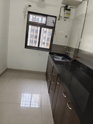 Kitchen in 2.5 BHK Apartment at Dosti Vihar, Samata Nagar – for Rent