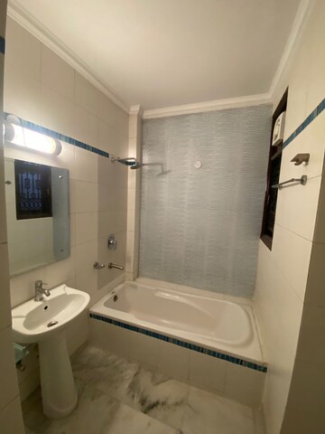 Bathroom in 3 BHK Apartment at Unitech Uniworld Gardens, Sector 47 – for Rent
