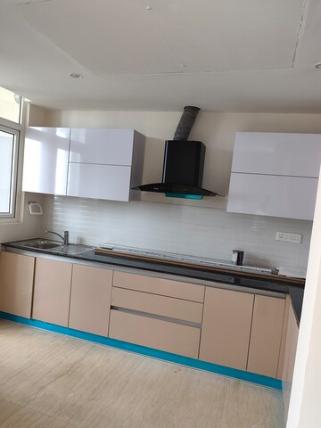 Kitchen in 3 BHK Apartment at Mahagun Mezzaria, Sector 78 – for Rent