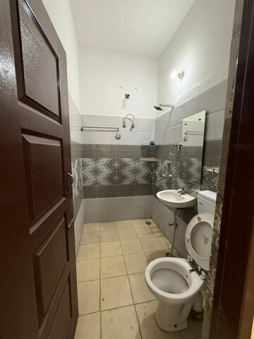 Bathroom in 2 BHK Apartment at Dhakoli – for Sale
