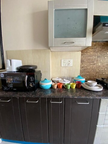 Kitchen in 2 BHK Apartment at Prateek Wisteria, Sector 77 – for Rent