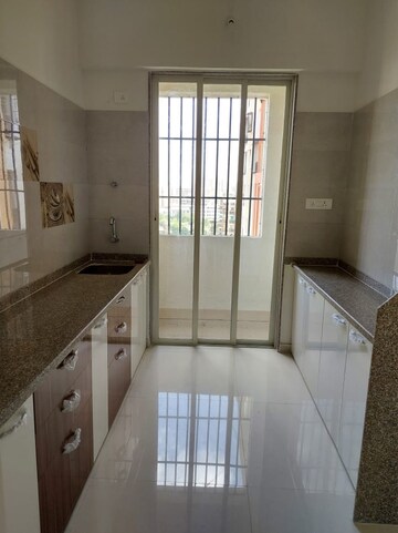 Kitchen in 1 BHK Apartment at Rutu Riverview Classic, Kalyan West – for Sale