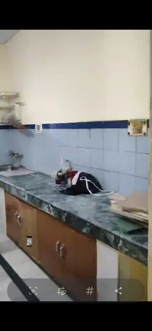 Kitchen in 2 BHK Apartment at Varun Apartment Noida, Sector 62 – for Sale