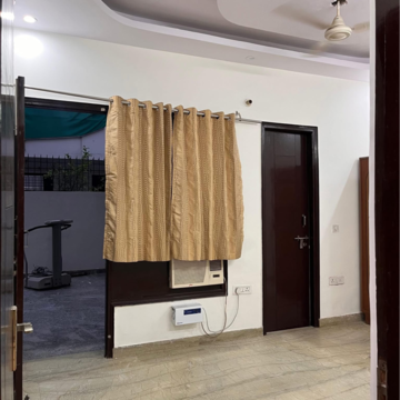 Bedroom in 2 BHK Builder Floor at Ansal Plaza Sector-23, Carterpuri Village – for Rent