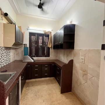 Kitchen in 2 BHK Builder Floor at Ansal Plaza Sector-23, Carterpuri Village – for Rent