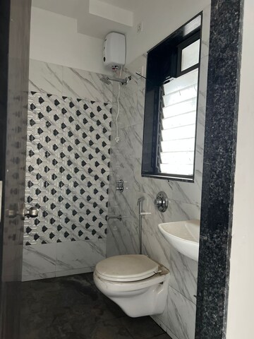 Bathroom in 1 BHK Apartment at UK Iridium Tower 2, Kandivali East – for Rent