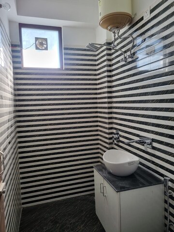 Bathroom in 2 BHK Apartment at Sahastradhara – for Rent
