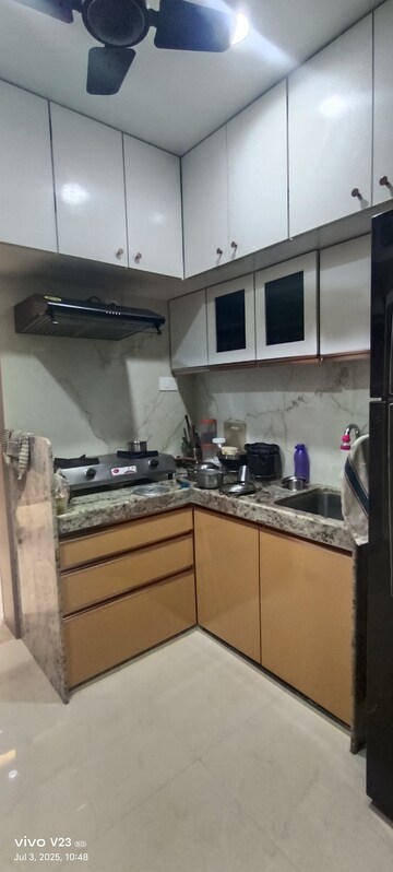 Kitchen in 1 BHK Apartment at Satellite Garden, Goregaon East – for Rent