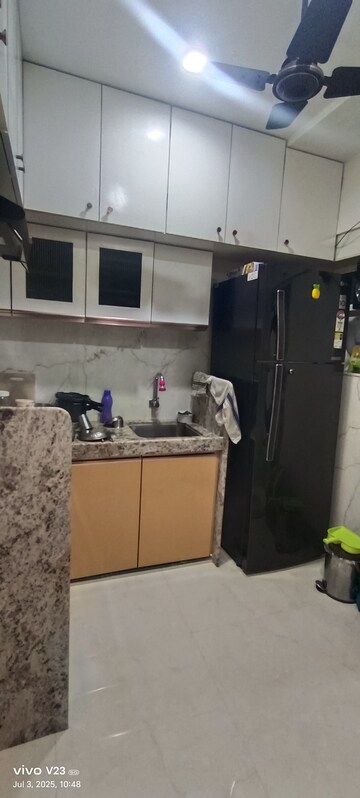 Kitchen in 1 BHK Apartment at Satellite Garden, Goregaon East – for Rent