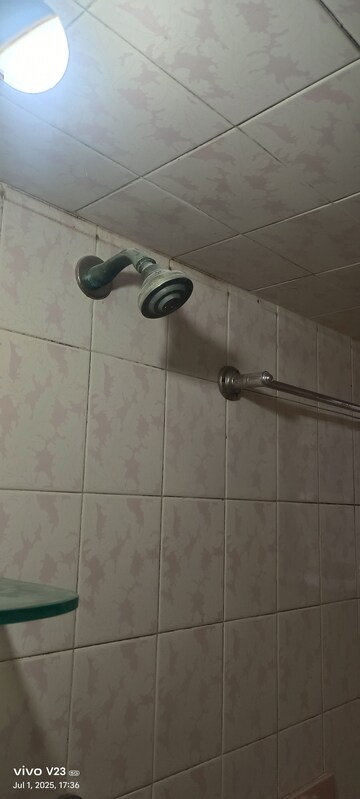 Bathroom in 1 BHK Apartment at Divya Stuti CHS, Goregaon East – for Rent
