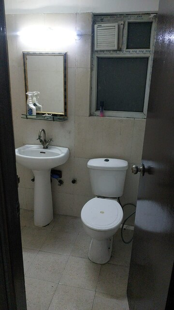 Bathroom in 2 BHK Apartment at Antriksh Golf View, Sector 78 – for Rent