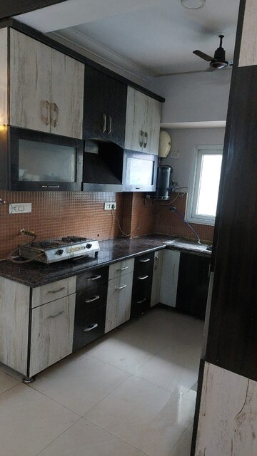 Kitchen in 2 BHK Apartment at Antriksh Golf View, Sector 78 – for Rent