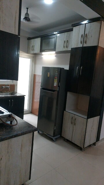 Kitchen in 2 BHK Apartment at Antriksh Golf View, Sector 78 – for Rent