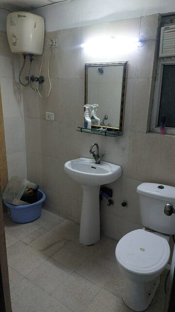 Bathroom in 2 BHK Apartment at Antriksh Golf View, Sector 78 – for Rent
