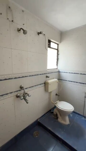 Bathroom in 2 BHK Apartment at Sunshree Woods, Nibm Road – for Rent