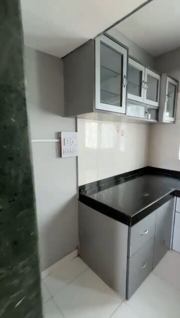 Kitchen in 2 BHK Apartment at Sunshree Woods, Nibm Road – for Rent