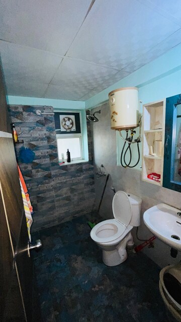 Bathroom in Studio Apartment at Kaveri City Center, Delta I Greater Noida – for Sale
