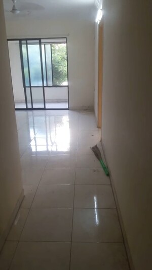 Bathroom in 2 BHK Apartment at Sunshree Woods, Nibm Road – for Sale