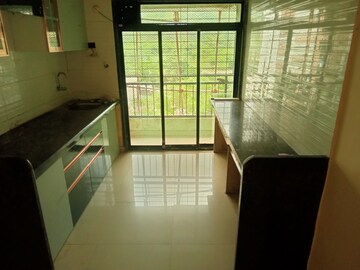 Kitchen in 2 BHK Apartment at Maitri Planet, Kharghar – for Rent