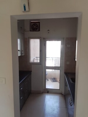 Kitchen in 2 BHK Apartment at Ramprastha Awho, Sector 95 – for Sale