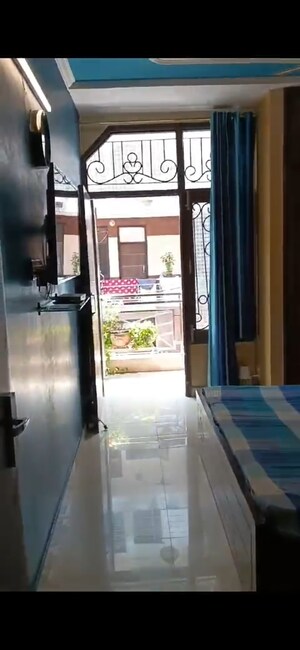 Bedroom in 3 BHK Builder Floor at DDA Taimoor Enclave, New Friends Colony – for Sale