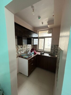 Kitchen in 2.5 BHK Apartment at Amrapali Riverview, Amrapali Leisure Valley – for Sale