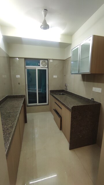 Kitchen in 1 BHK Apartment at Chandiwala Pearl Platinum, Jogeshwari West – for Sale