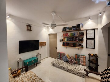 Living Room in 1 BHK Apartment at New Jay Palace, Yari Road – for Rent