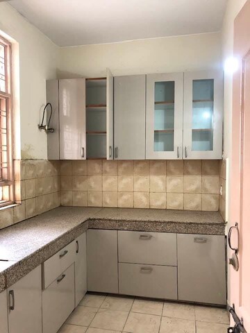 Kitchen in 3 BHK Apartment at Raheja Teachers Apartments, Sector 31 – for Rent